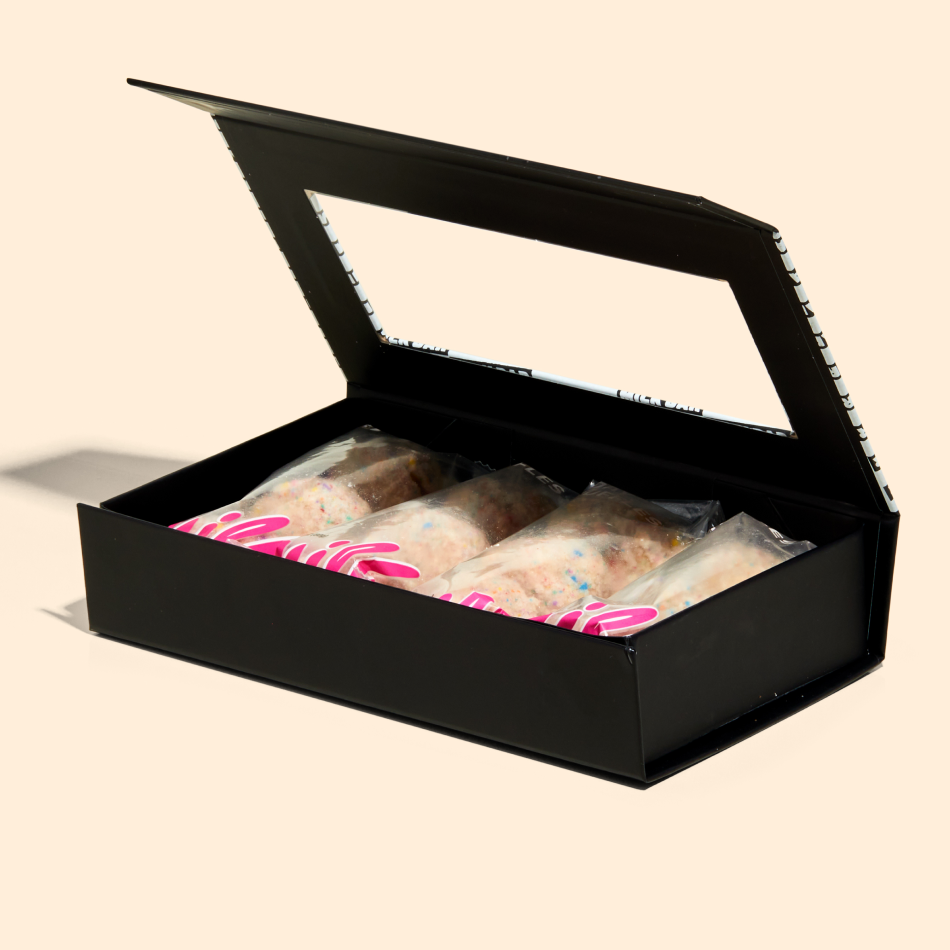 The birthday cake truffle dozen box with the lid opened.